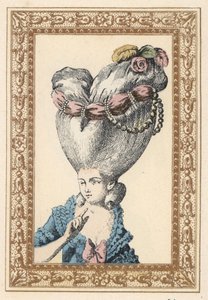 Femme avec cheveux relevés sur un pouf et décorés de fleurs, perles et d
