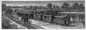 Application des batteries Faure : Train électrique sur une voie ferrée dans une gare. Gravure dans "Le Monde Illustré"