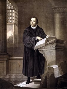 Martin Luther (1483 - 1546) lisant dans une église.