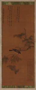Un oiseau sur une branche feuillue