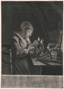 Une vieille femme répare son rouet
