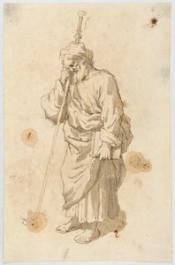 Homme barbu avec un bâton