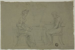 Homme et femme assis à une table