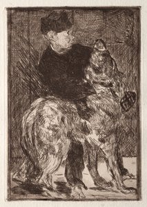 Le garçon avec un chien