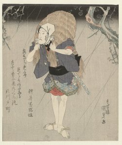 Homme en manteau de pluie en paille