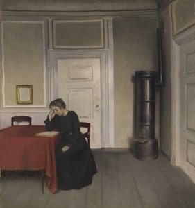Intérieur avec femme lisant