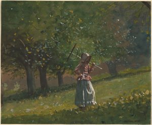 Fille avec un râteau à foin