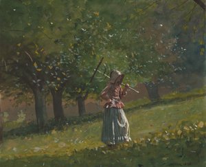Fille avec râteau à foin
