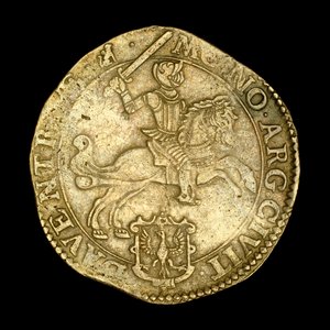 Pièce ancienne représentant un chevalier à cheval