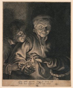 Vieille femme et un garçon avec des bougies