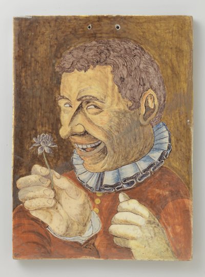 Plaque de faïence avec homme avec fleur - Anonymous