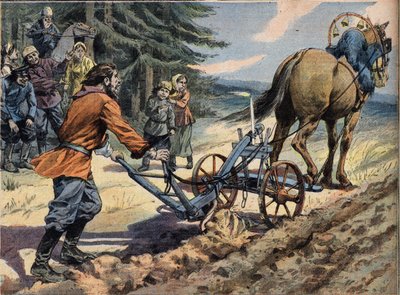 Un paysan russe labourant le champ avec l
