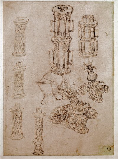 Trois casques surmontés de cimiers et deux pièces de canons démantelés - Antonio Pisanello