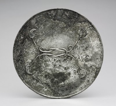 Miroir avec un manche en forme de nœud d