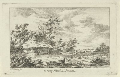 Homme avec un râteau près d
