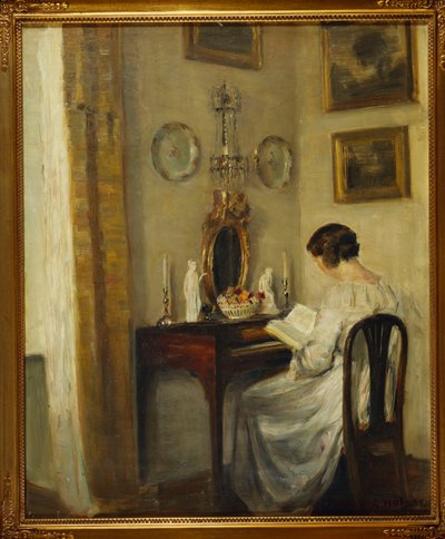 Intérieur avec une fille lisant à un bureau - Carl Holsoe