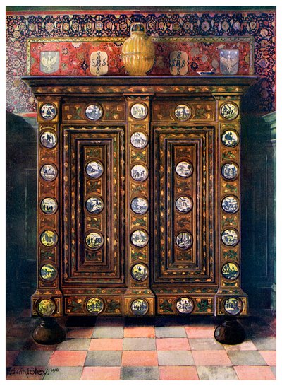 Kas en noyer incrusté et avec médaillons peints de faïence de Delft, 1910 - Edwin Foley