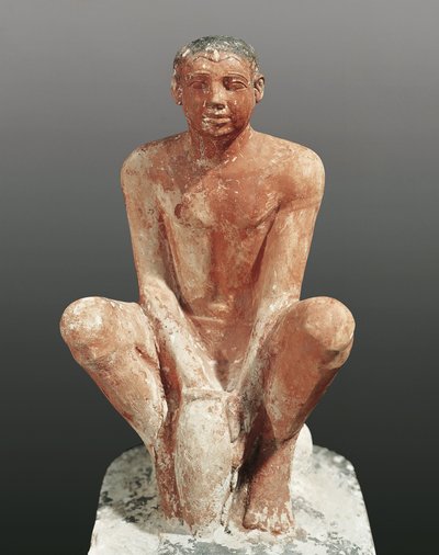 Civilisation égyptienne, statue en calcaire peint représentant un homme modelant de l