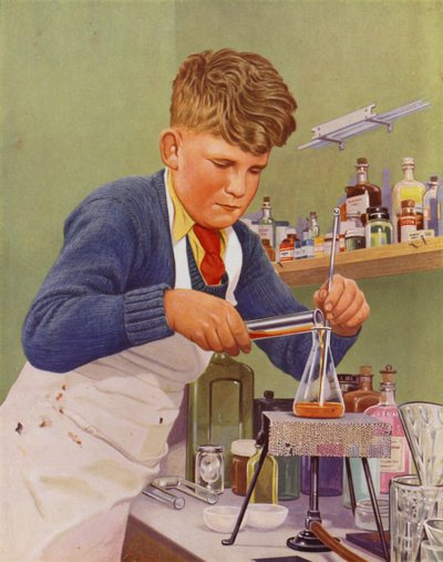 Garçon réalisant une expérience de chimie - English School