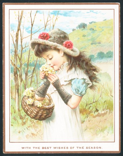 Fille sentant des fleurs d
