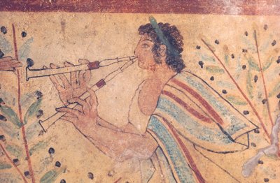 Art étrusque : un joueur de flûte. Détail d