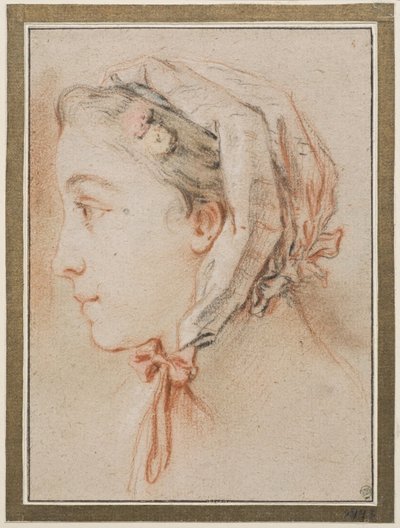 Tête de femme, de profil, coiffée d