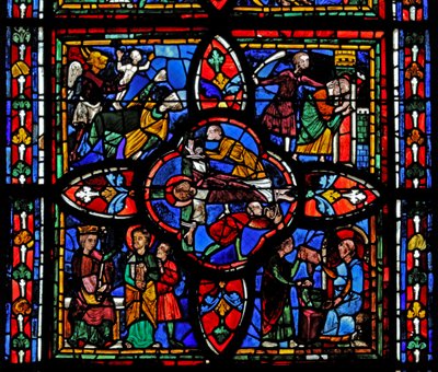 Fenêtre représentant la deuxième section de la fenêtre w7 : au centre est la crucifixion de Saint Pierre ; ailleurs Saint Pierre devant Néron ; Saint Pierre emprisonné ; le diable prend une âme - French School