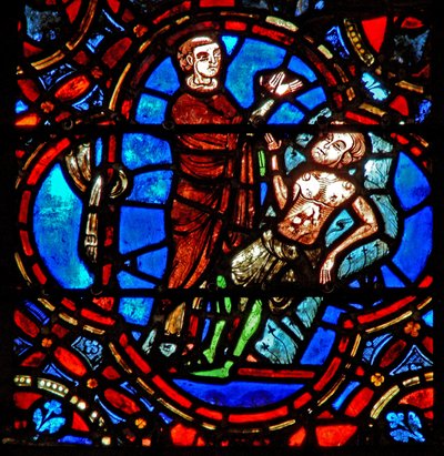Fenêtre w12 représentant une scène dans la fenêtre du Bon Samaritain : un autre voyageur voit le pèlerin blessé - French School