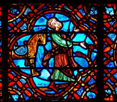 Fenêtre w12 représentant une scène dans la fenêtre du Bon Samaritain : le Samaritain descend de son cheval - French School