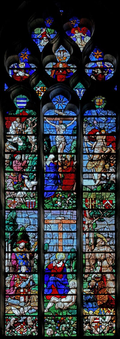 Fenêtre w25 représentant la Crucifixion avec Saint Hubert et Saint Christophe ; en dessous, le donateur Louis de Roncherolles et sa femme Françoise de Halluin avec Saint Louis et Saint François - French School