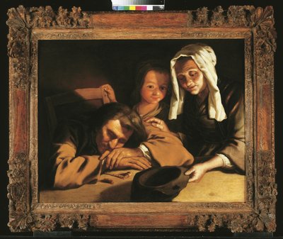 Intérieur éclairé à la bougie avec des figures autour d