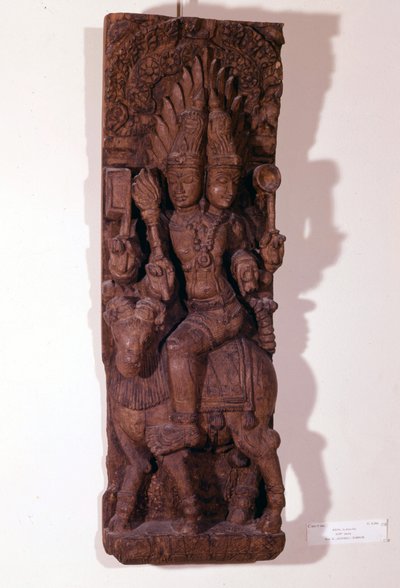 Agni, dieu du feu, représenté avec deux têtes (bicéphale) sur un bélier, selon la mythologie hindoue. Sculpture en bois du XVIIe siècle. Paris, Musée Guimet - Indian School