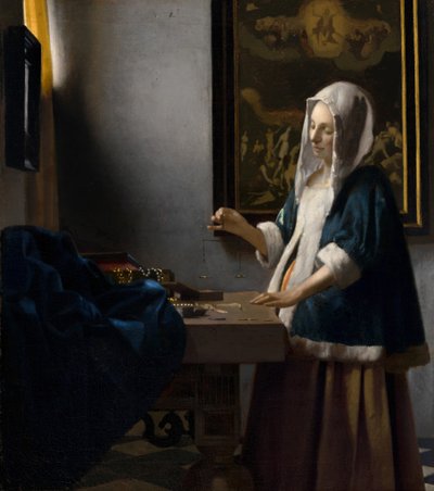Femme tenant une balance - Johannes Vermeer