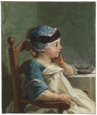 Garçon dans une chaise d
