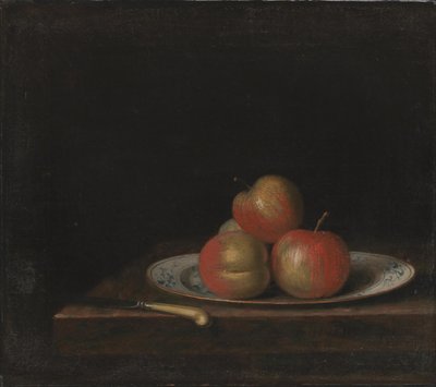 Nature morte avec pommes sur une assiette 
