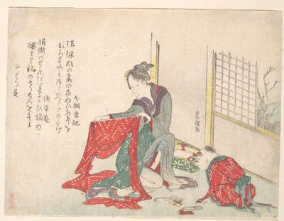 Femme pliant un linge - Katsushika Hokusai