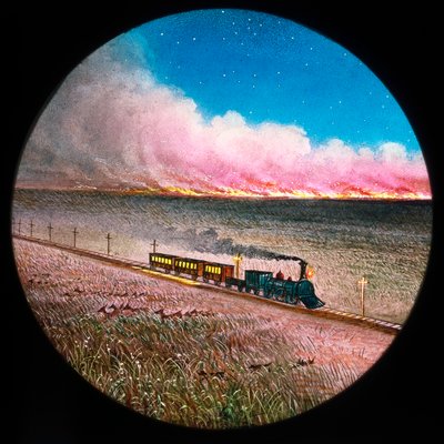 Prairie en feu avec train, lanterne magique colorée à la main - Unbekannt Unbekannt