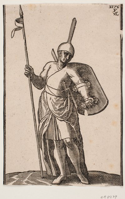 Soldat debout, vu de face; coiffure avec un sommet haut et fin; dans la main droite une lance, sur le bras gauche un bouclier vu de l