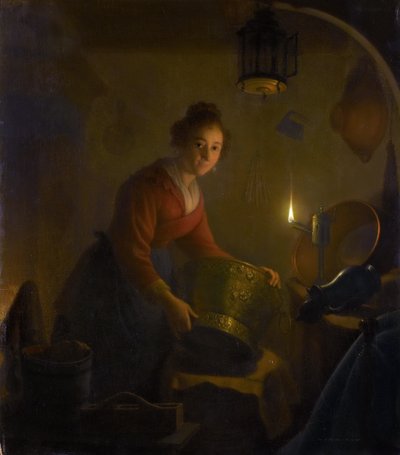 Femme dans une cuisine à la lumière d