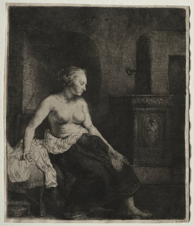 Femme assise à moitié habillée près d