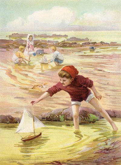 Son nouveau bateau - garçon jouant avec un bateau jouet sur la plage - Robert Lillie
