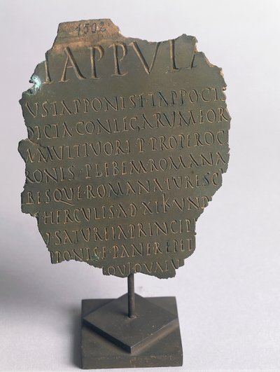 Lex Tappula, fragment de loi satirique rédigée par un cercle convivial de Vercelli, parodie écrite sous la même forme que les plébiscites romains, faisant partie des leges conviviales transmises par Festo, bronze, civilisation romaine - Roman