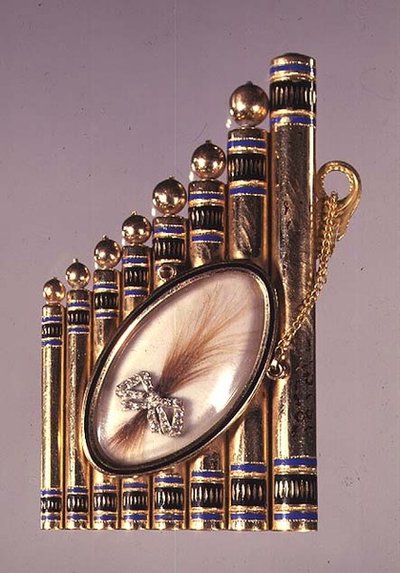 Pendentif en or avec décoration en émail et serti d