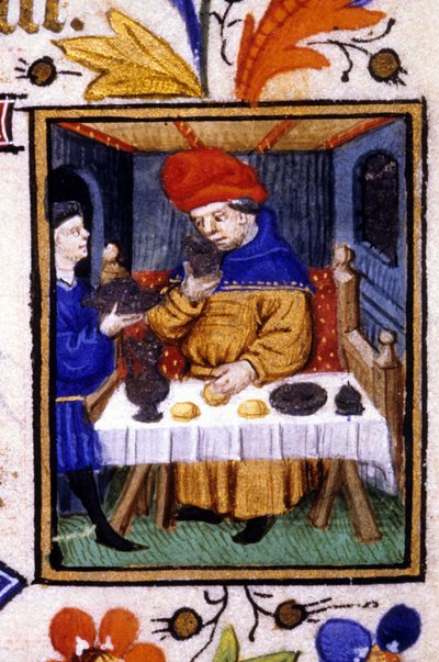 Performance du mois de janvier. Un serviteur met de la nourriture sur la table de son maître. Miniature d
