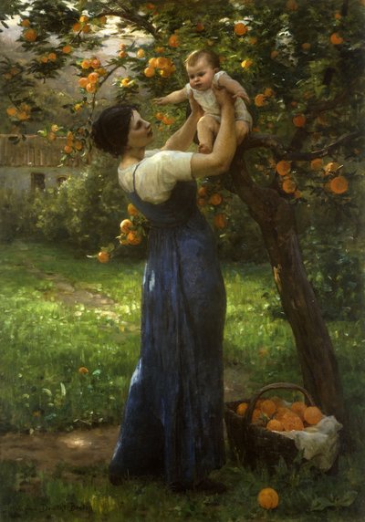 Mère et enfant dans un verger d