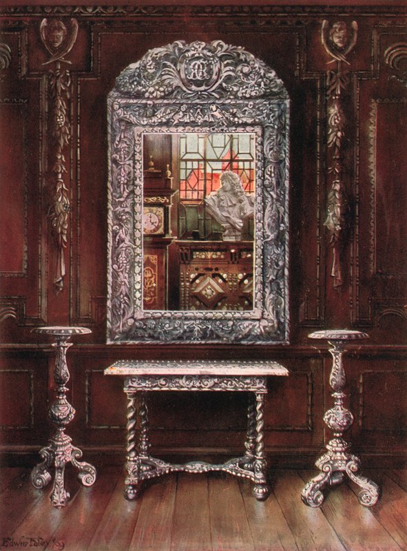 Miroir, guéridons et table recouverts de plaques d