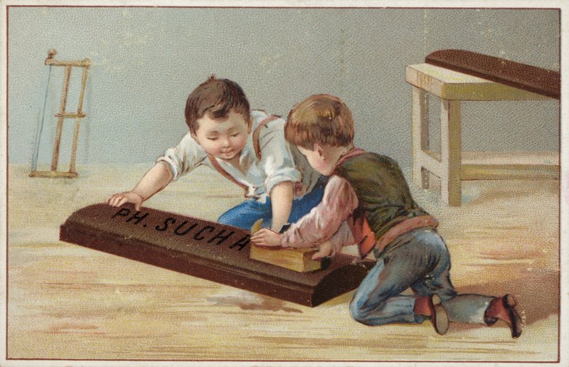 Enfants construisant une grande barre de chocolat en bois, publicité pour le chocolat Suchard - French School