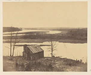 [Maison sur la rive du fleuve]