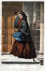 Courses de Noël : une jeune femme élégante frappe à la porte d