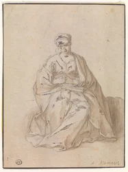 Marie, assise avec un livre